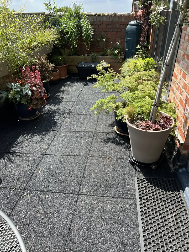 Finished terrace surface with planters in Hampstead