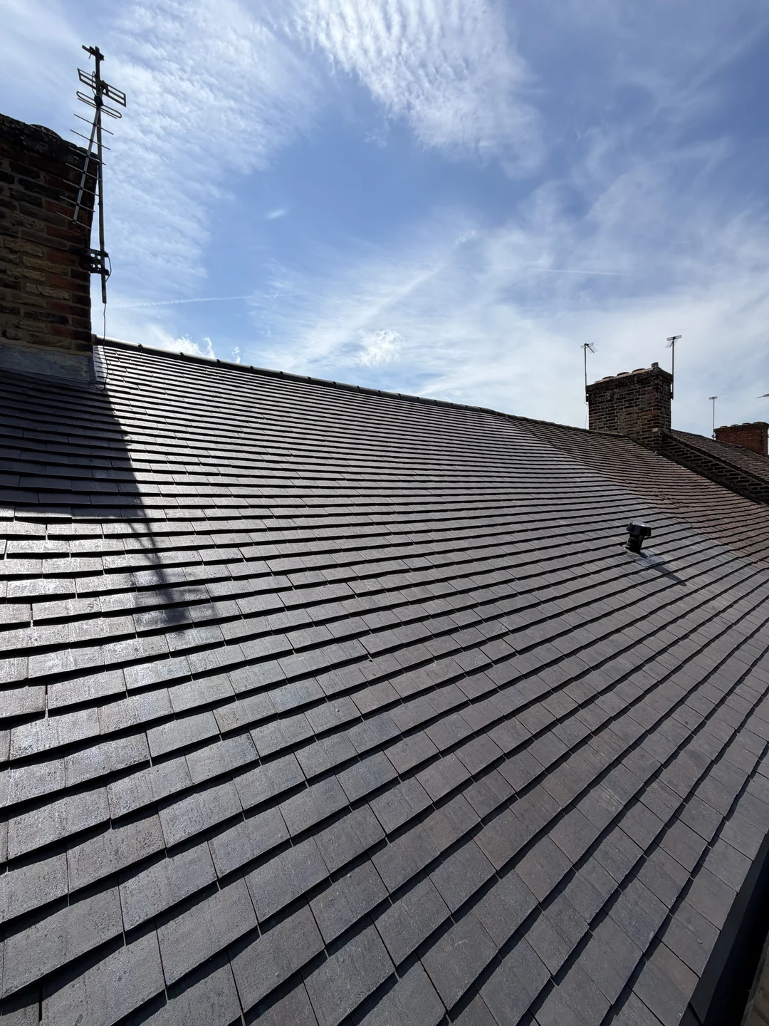 Completed pitched roof replacement by Avent Roofing in Finchley